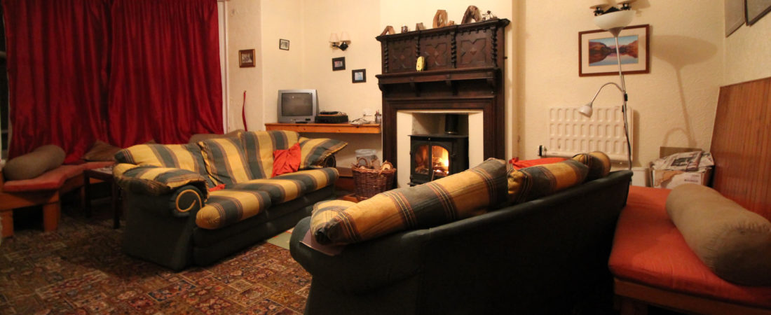 group accommodation in snowdonia, lounge with log burner
